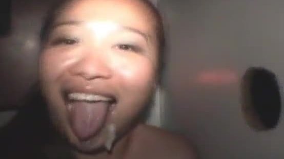Asian amateur dirtbag down on her knees sucking at glory hole