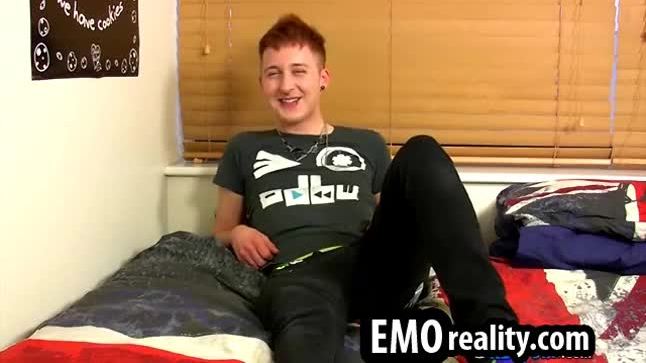 Sexy and young emo twink talks to the camera and jerks off