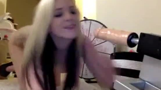 Beautiful blonde teen gagging on fuck machine