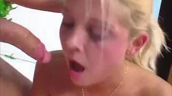 Blonde gags cock in a soapy bathtub
