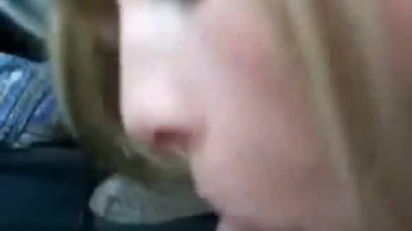 Blonde blows him in a car