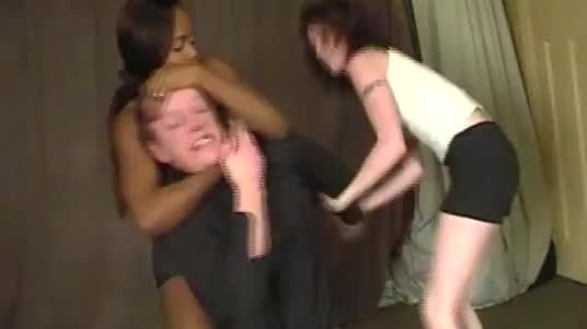 Strong black woman with a friend wrestles a guy into submission