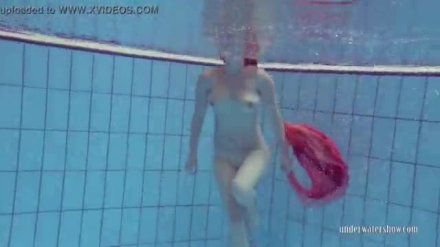 Redhead in the pool