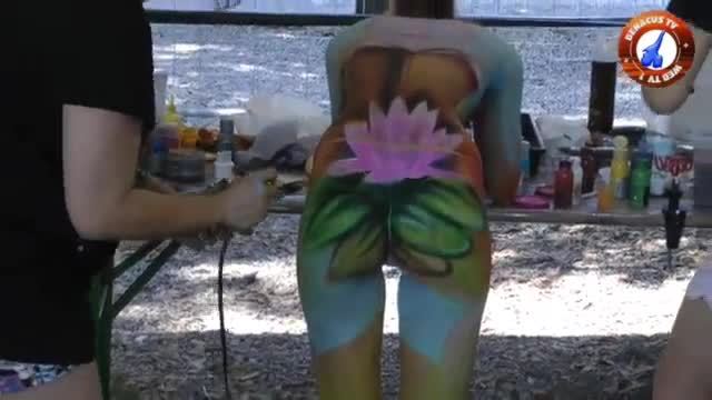 Nude real girl body painting